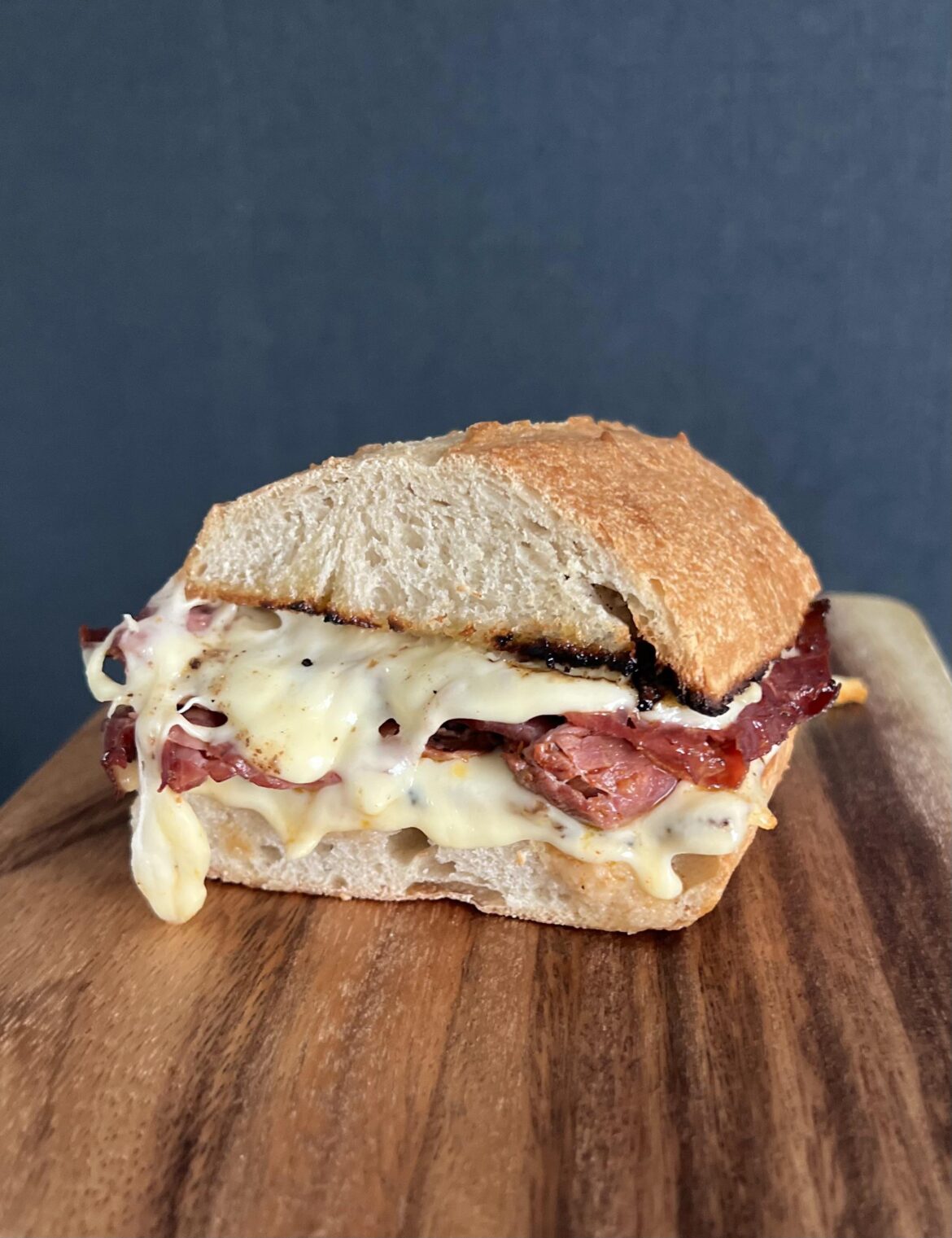 Pastrami melt with gouda and mozzarella on sourdough.