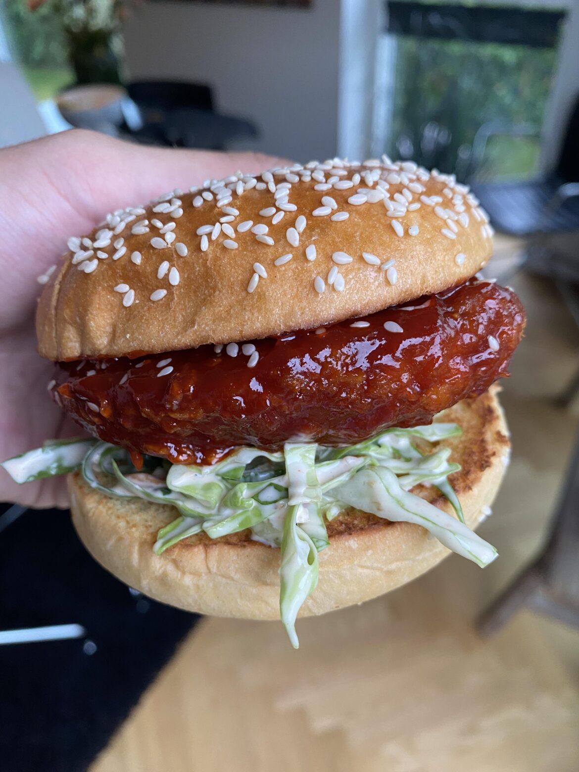Sandwich with Fried Chicken tossed in gochujang and coleslaw with kimchee