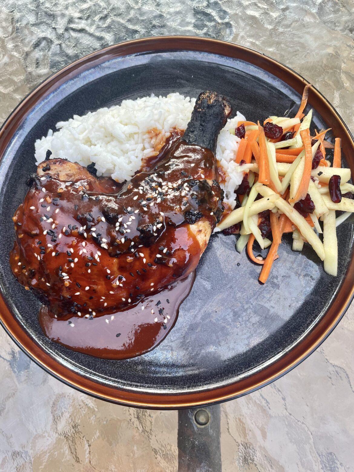 Gochujang marinated chicken with an apple broccoli stem slaw