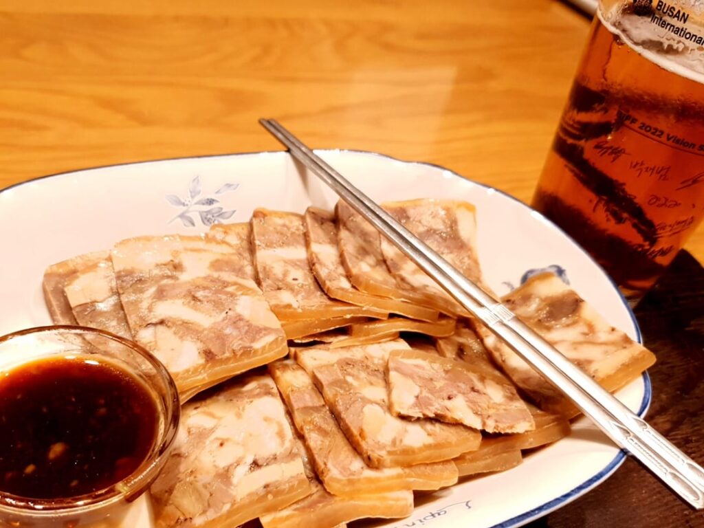 pyeonyuk, that is unboned, pressed pig head meat. Personally calling it as korean spam.