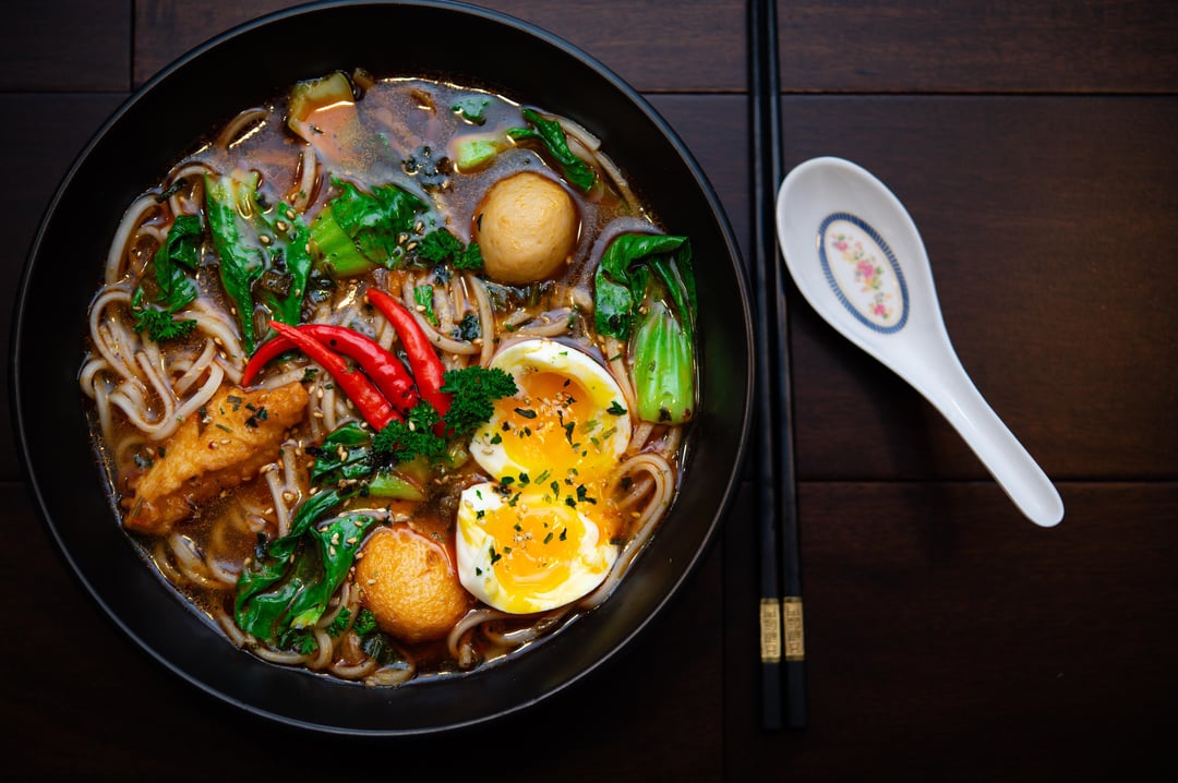Spicy beef flavor ramen with fish cakes. Dining and Cooking