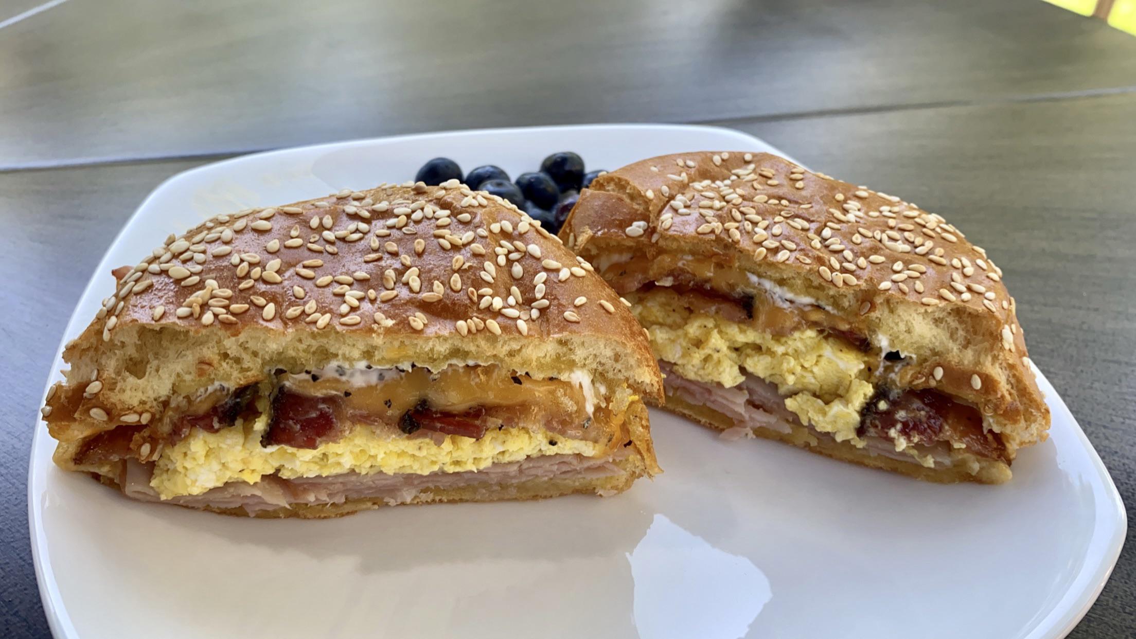 Toasted Farmhouse Sandwich, ham, egg, bacon, American cheese, cream