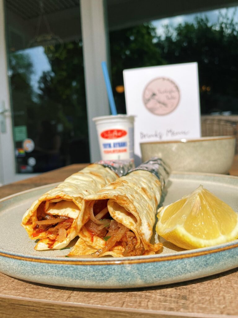 turkish street food: tantuni. small pieces of beef, spices, tomatoes, onion, parsley (originally) stir-fried with cotton oil. you have to squeeze some lemon juice on it! ayran (yoghurt drink) on the side of course