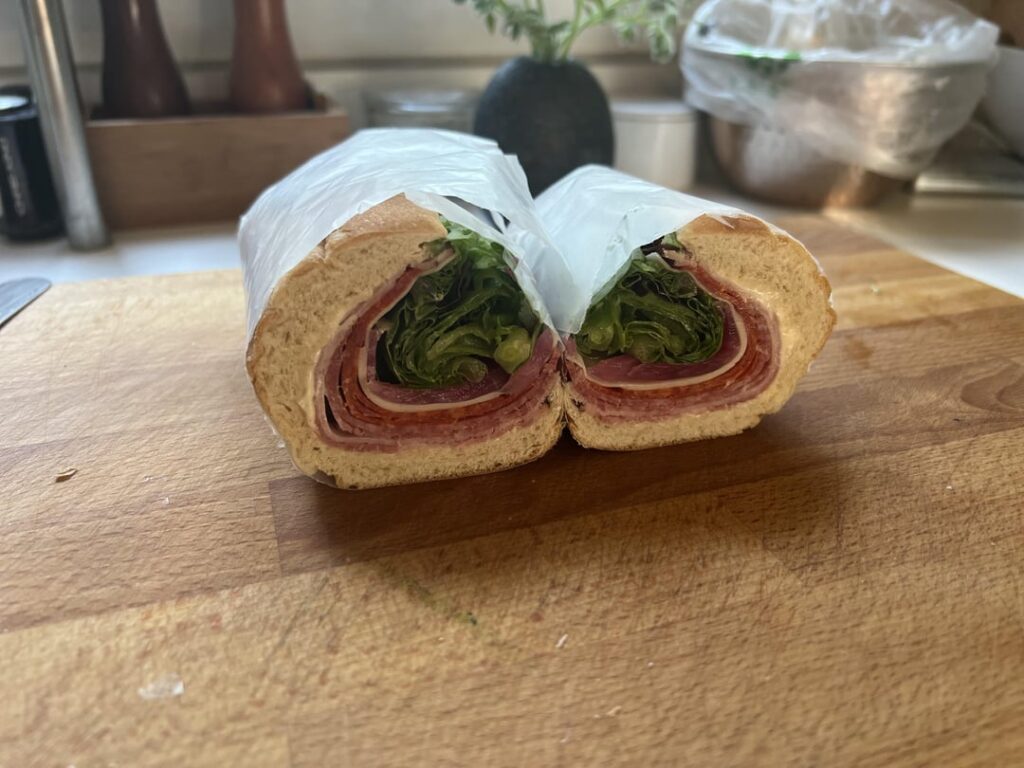 Grinder I made for the wife’s lunch today. Ham, Genoa, pepperoni, provolone, pickled onions, basil, and lettuce.