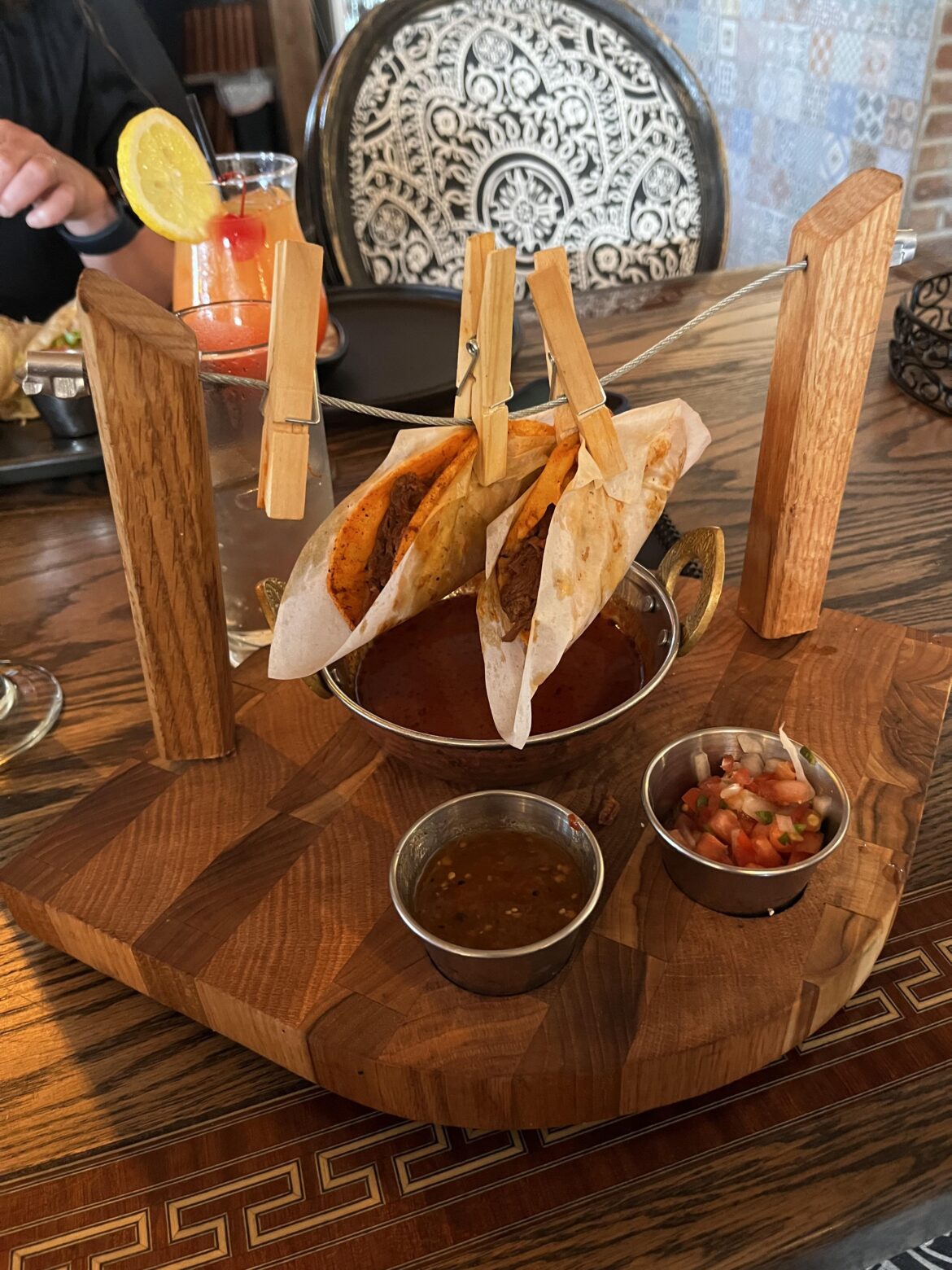 Hanging tacos - this was the only dish did not come on a plate. Why?