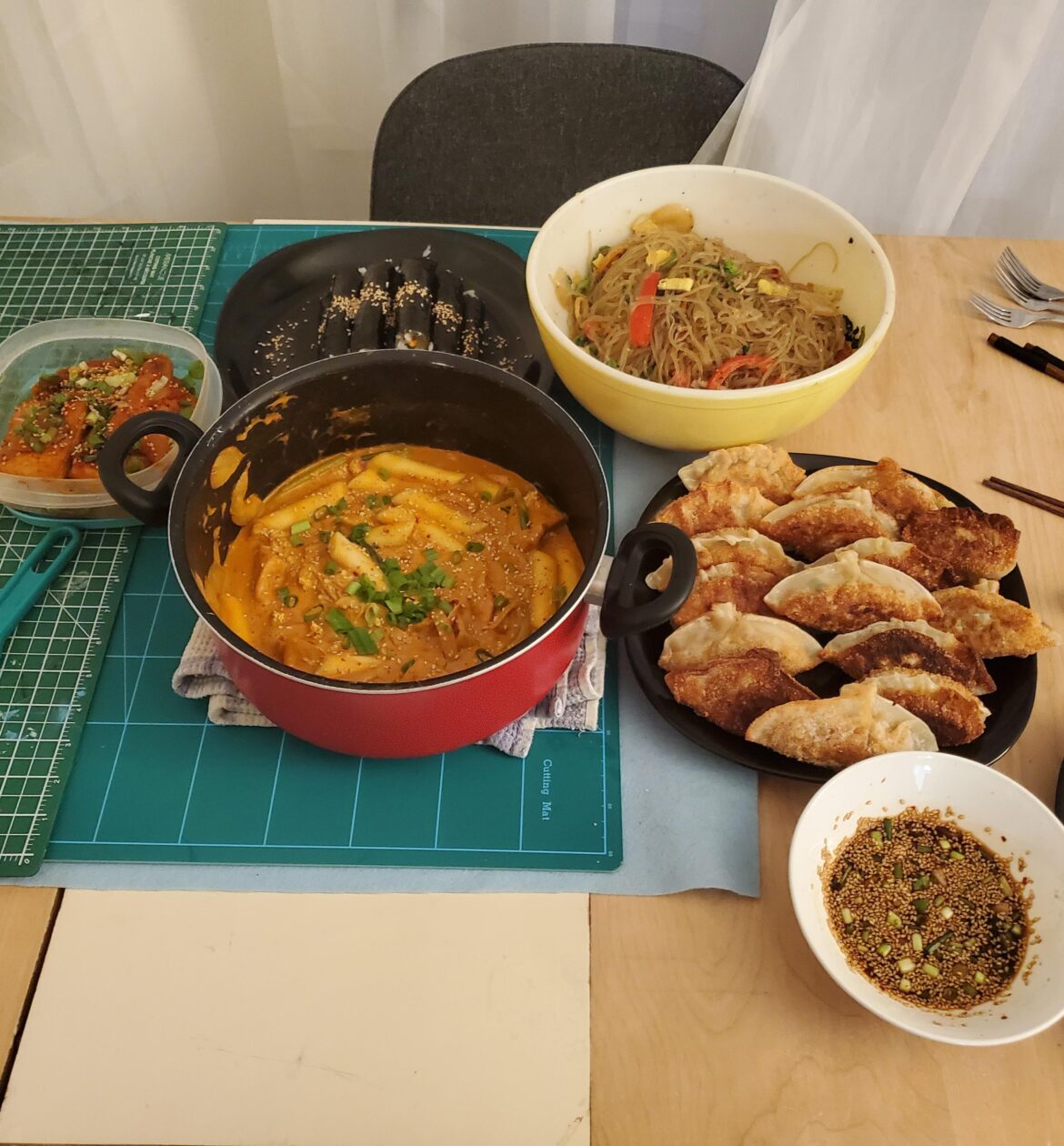 Dinner for my friends! Rosé tteokbokki, drug kimbap, japchae, homemade kimchi mandu, and braised tofu!