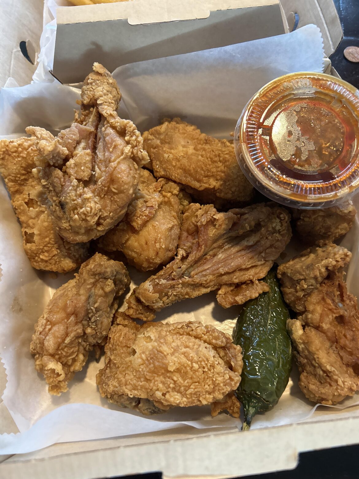 Hi-Wings (Korean Fried Chicken). This was their 9-pc dark meat order with sweet spicy sauce on the side.