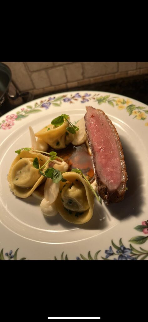 Duck breast, duck confit ravioli, celeriac, duck jus