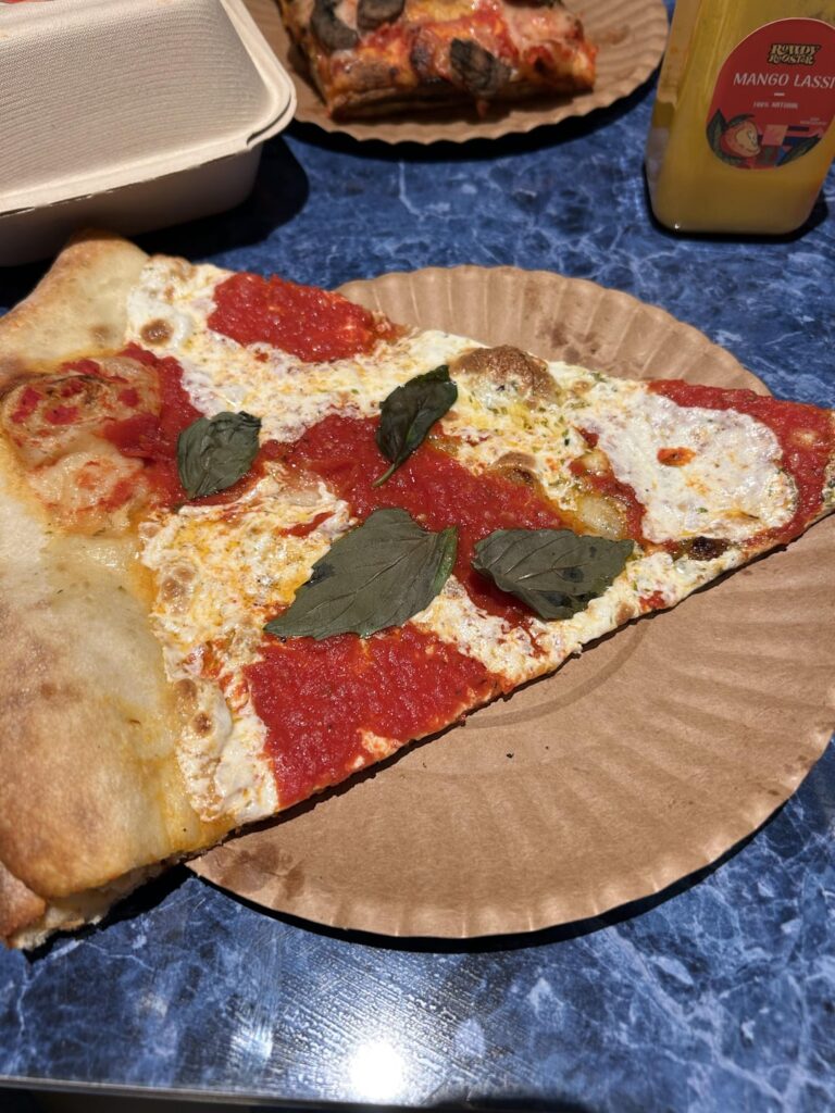 Margherita slice and mushroom Sicilian slice from Scarr’s Pizza in NYC