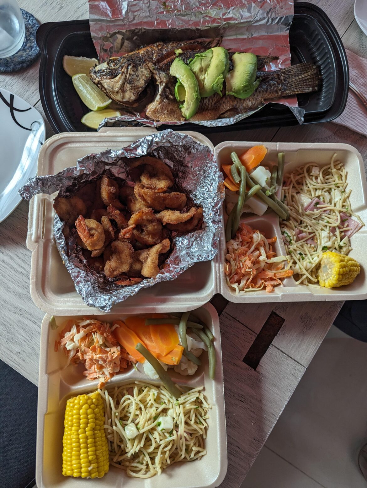 Tried out a new roadside mariscos stand tonight. Mojarra frita y camarones empanizados. Not the best Mojarra we've had, but the camarones was so good.