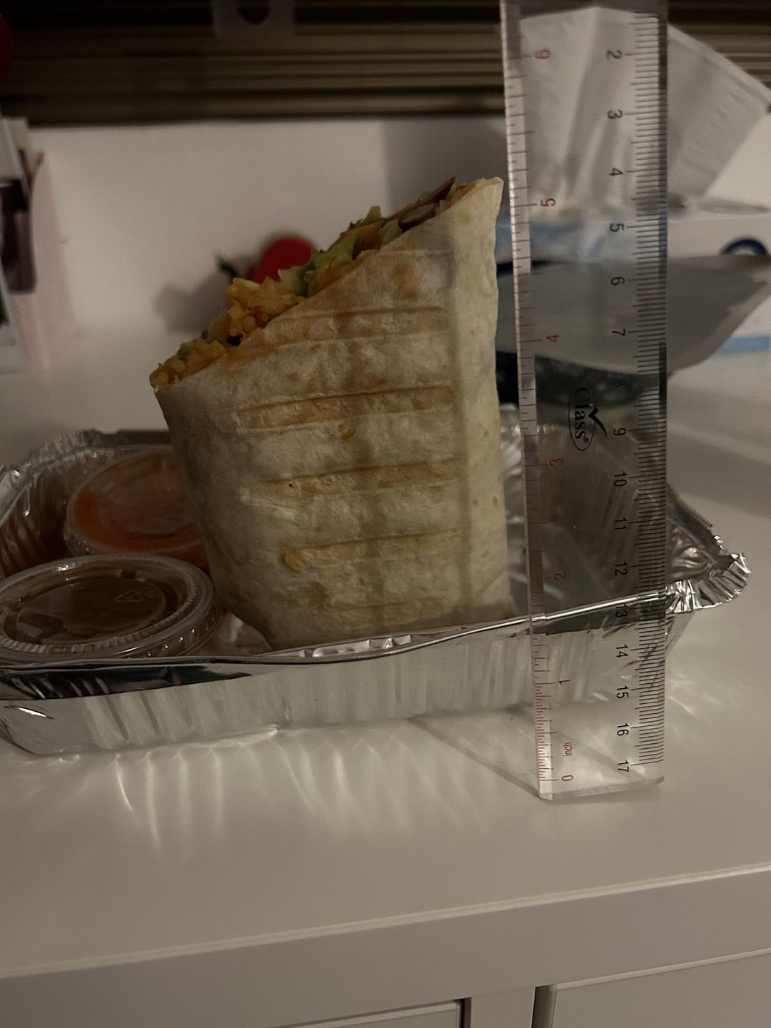 How many calories in 1/2 veggie burrito? (Beans, mex rice, veggies, corn, cheese Dining and