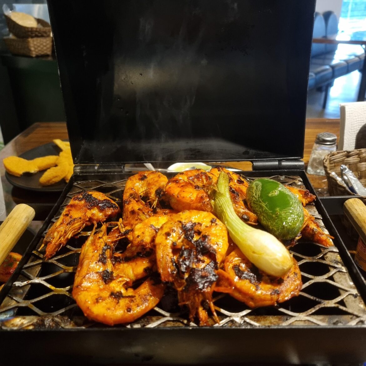 Camarones zarandeados right off the grill.