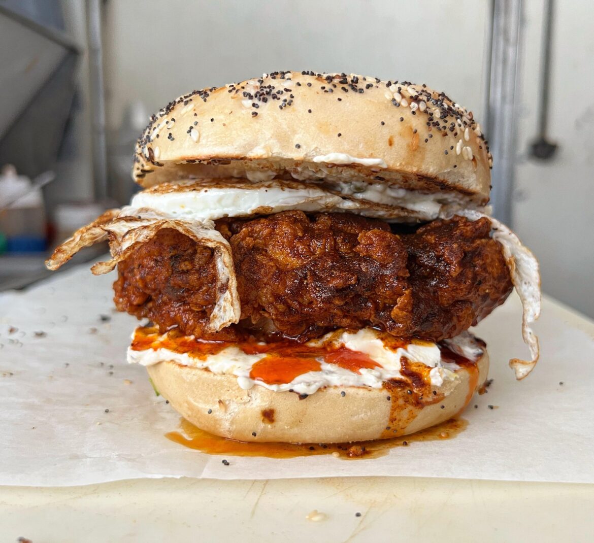 Hot chicken bagel. Nashville hot chicken, dill pickle schmear, egg.