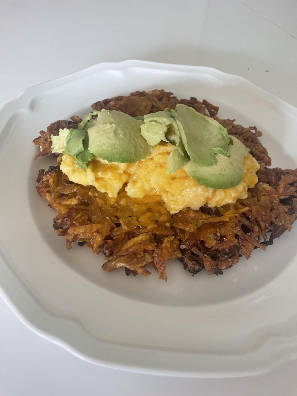 Potato pancake with slow scramble & avocado