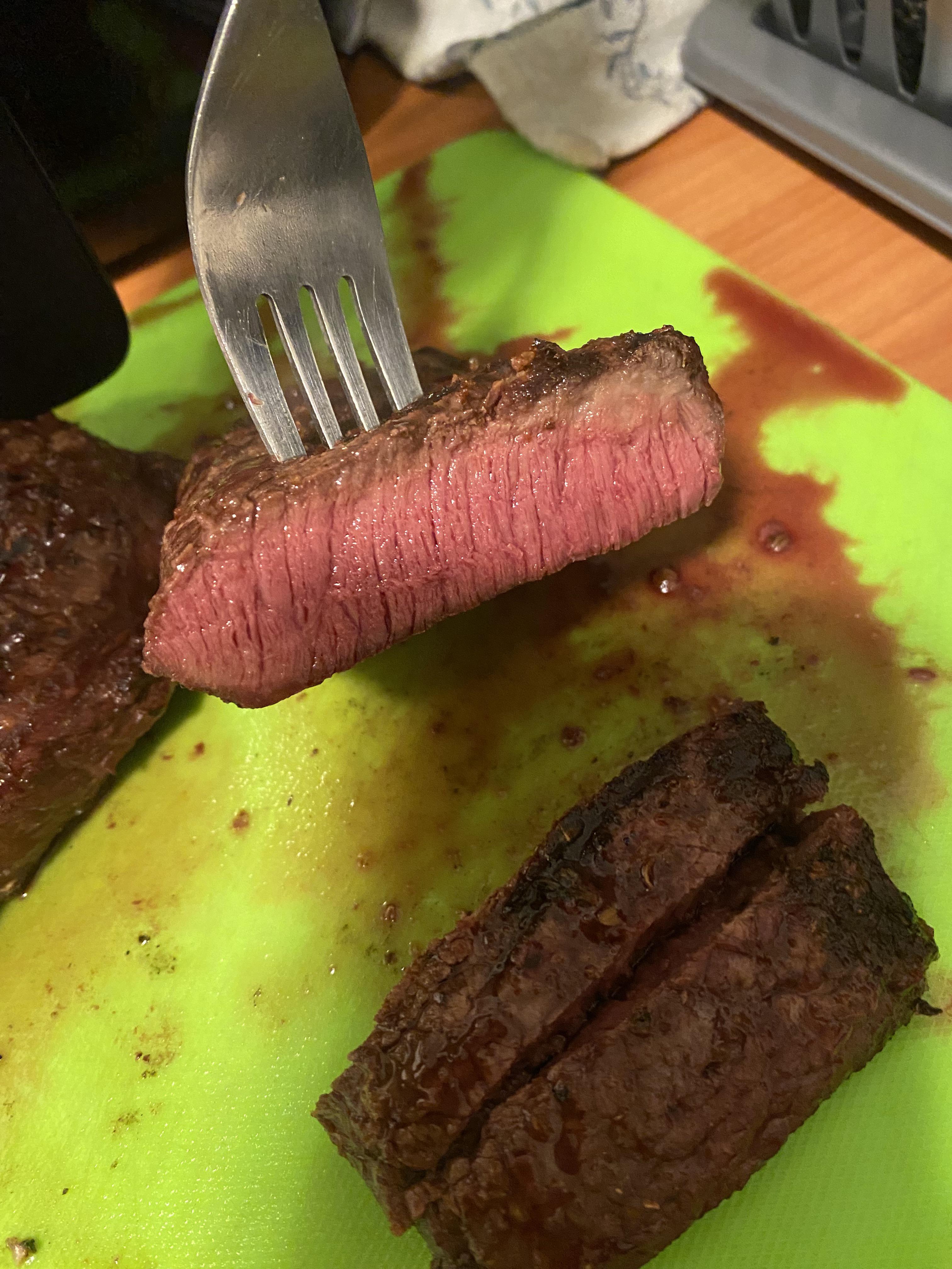 Perfect Braai steak on an open charcoal flame with a kettle weber. No