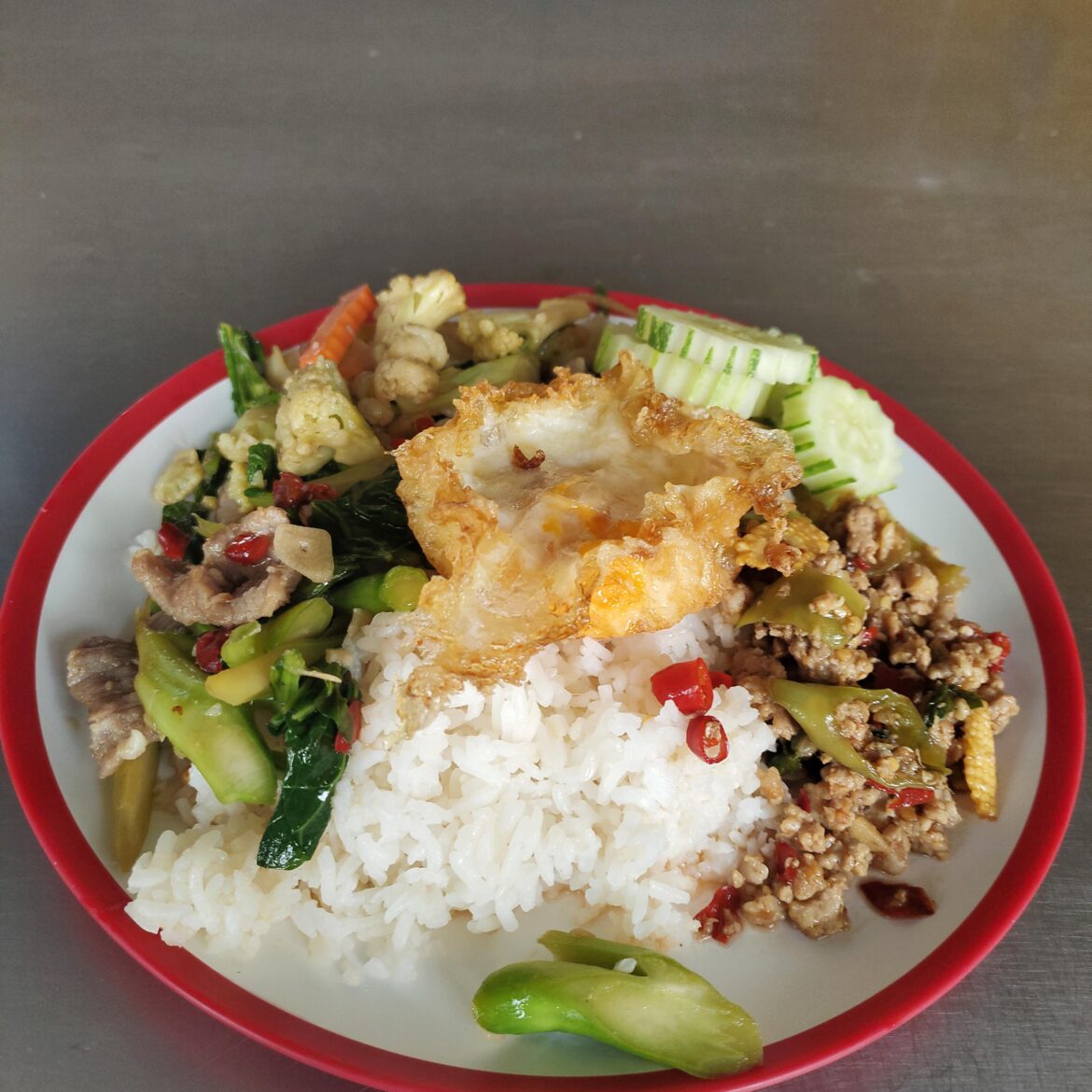 Lunch. Stopped at a PTT food court on my way to Bangkok. Excellent meal.