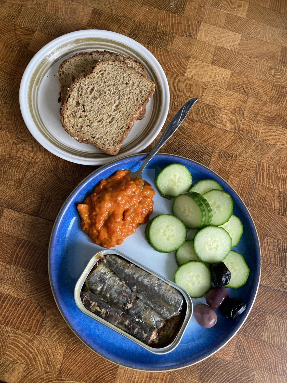 Lunch – sardines, cucumbers, olives, red pepper spread, wholegrain bread