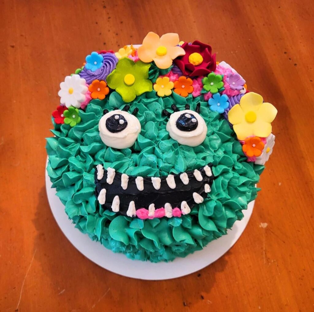 funfetti monster smash cake and cupcakes with vanilla buttercream for a "one"derful birthday party!