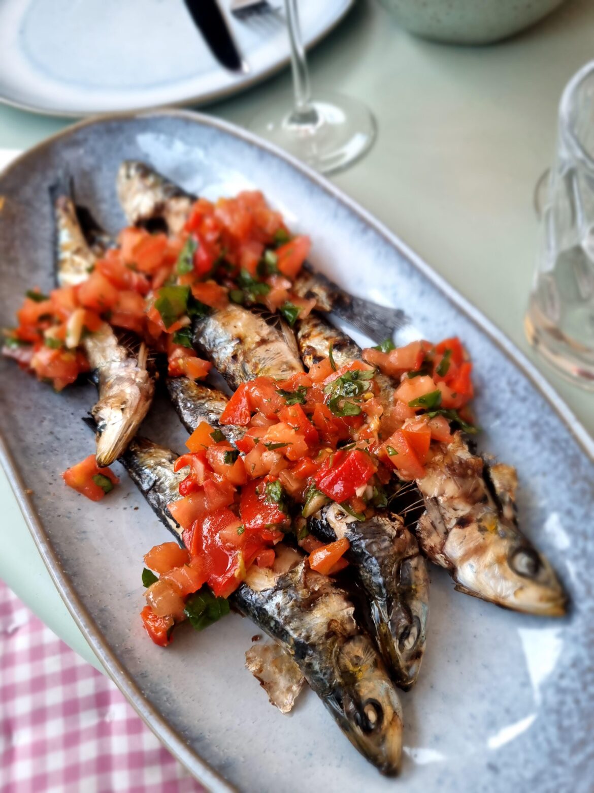 Barbecued sardines with tomato and grilled pepper relish