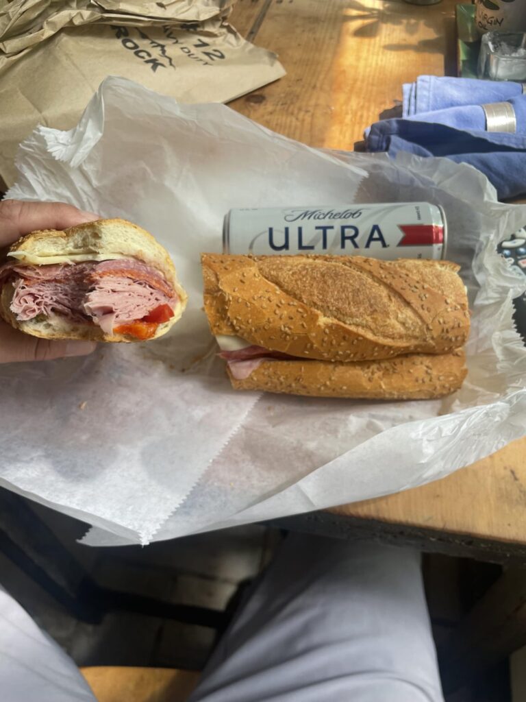 Italian combo(ham, pepperoni, salmi, provolone with oil/vinegar and sweet peppers) Michelob ultra for scale