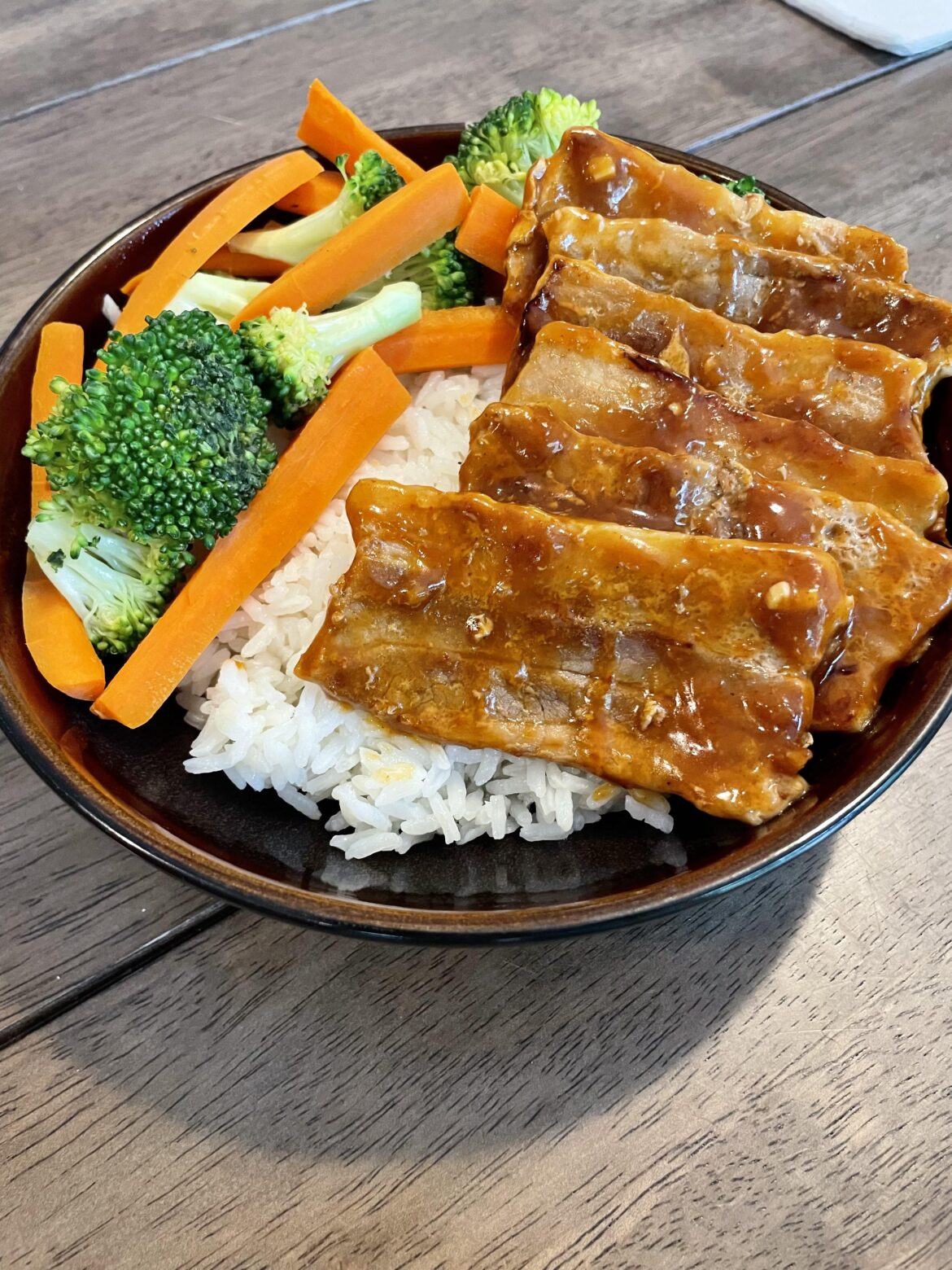 Pork belly in Gochujang sauce, steamed veggies, and white rice