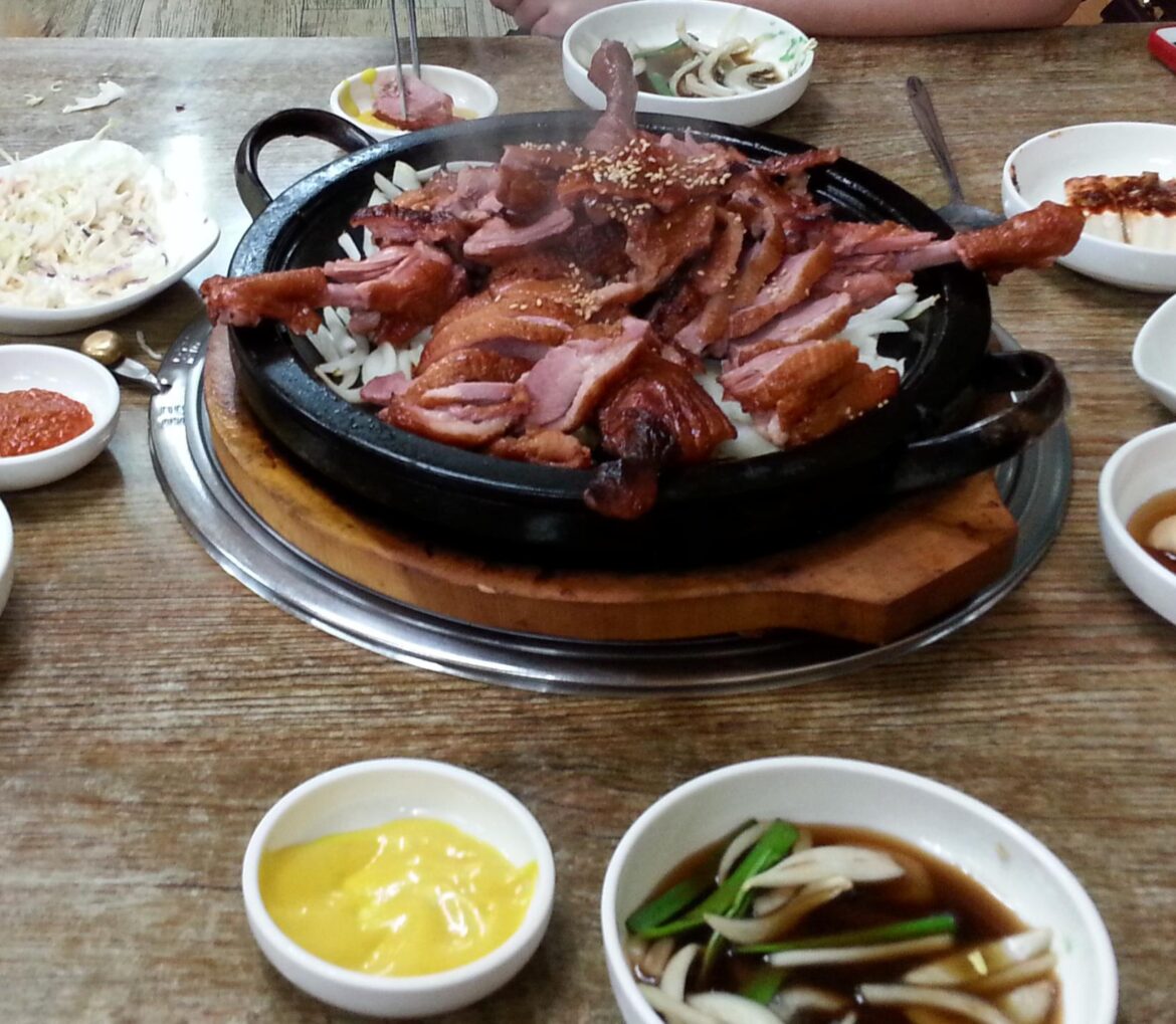 Had this roast duck in Gyeongju, South Korea. Best ever. Can someone tell me what the yellow sauce is? It was so delicious!