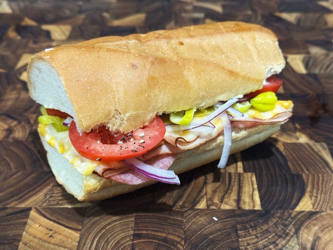 hot turkey and salami w/colby jack, dijon, mayo, pepperocini, tomato and red onion