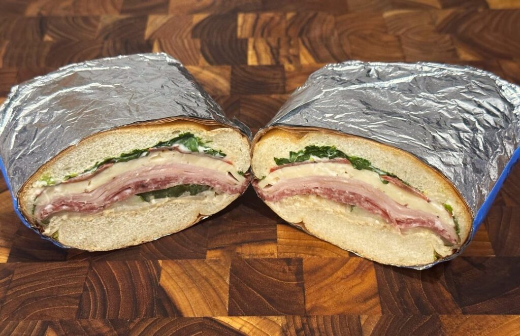 salami, turkey and havarti w/ mayo, "deli" mustard (its got horseradish in it), onion, homemade pickle, onion, tomato and lettuce.