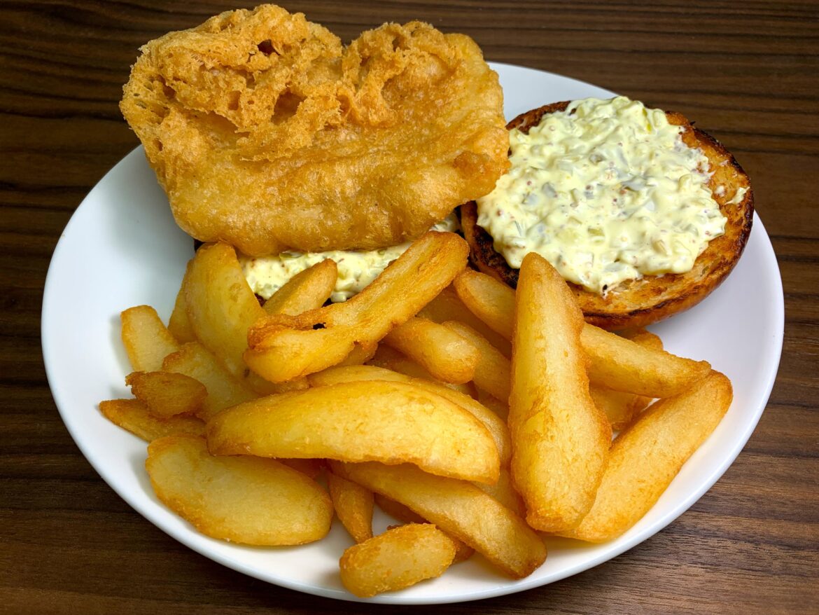 Beer/Vodka Battered Cod on a Toasted Potato Bun with Tartar Sauce and Crispy Chips