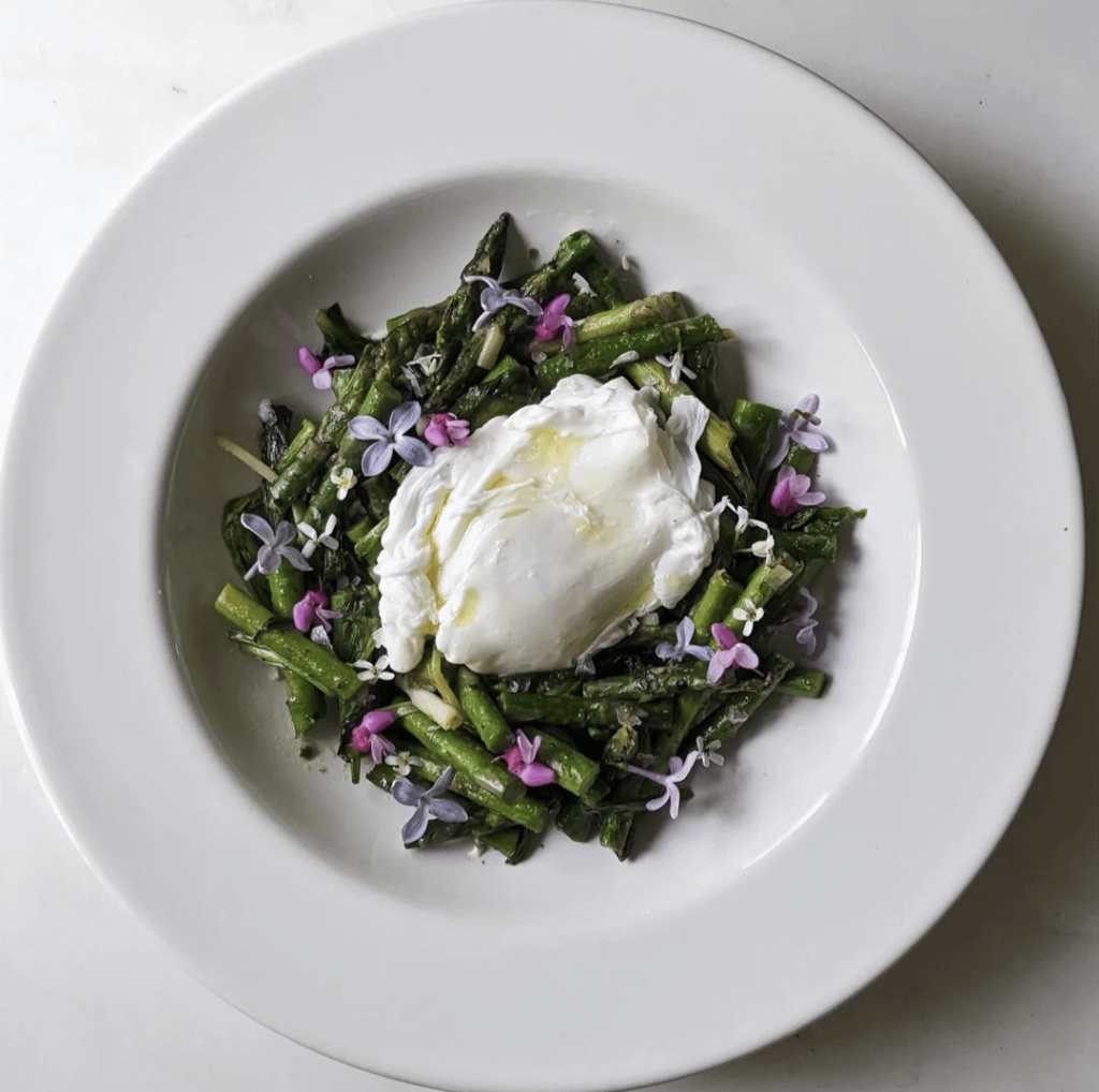 Asparagus, ramps, goat cheese, poached egg, charred spring onion and fenugreek vinaigrette
