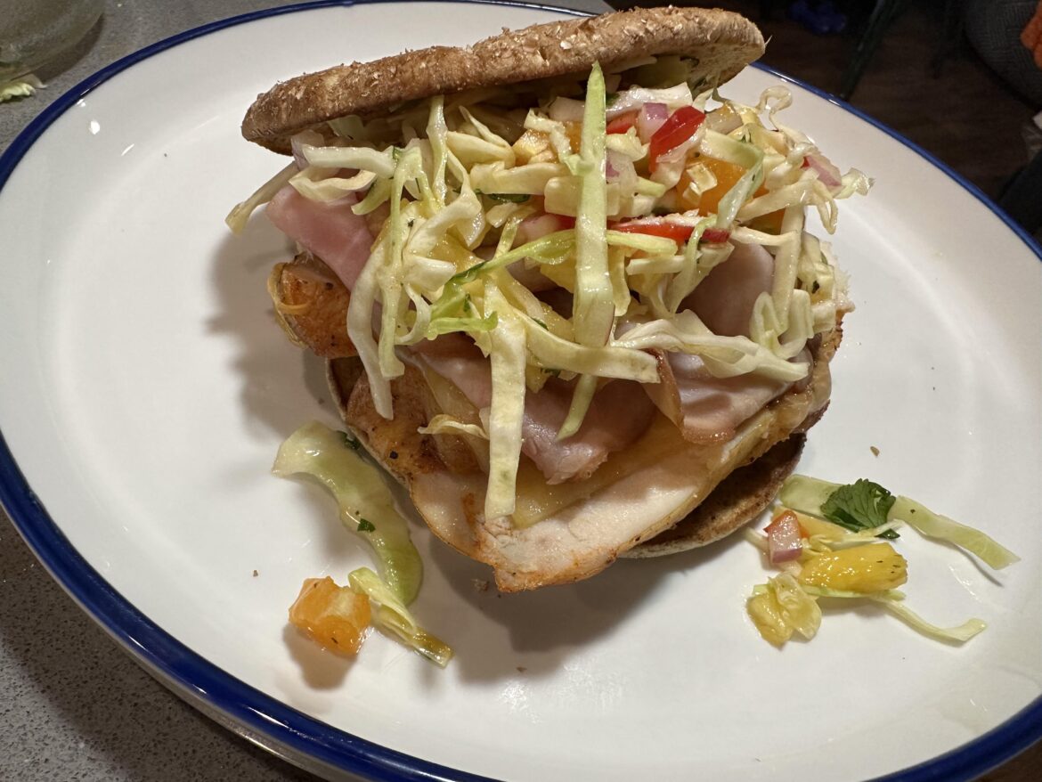 Teriyaki chicken sandwich with a sweet and spicy pineapple slaw.
