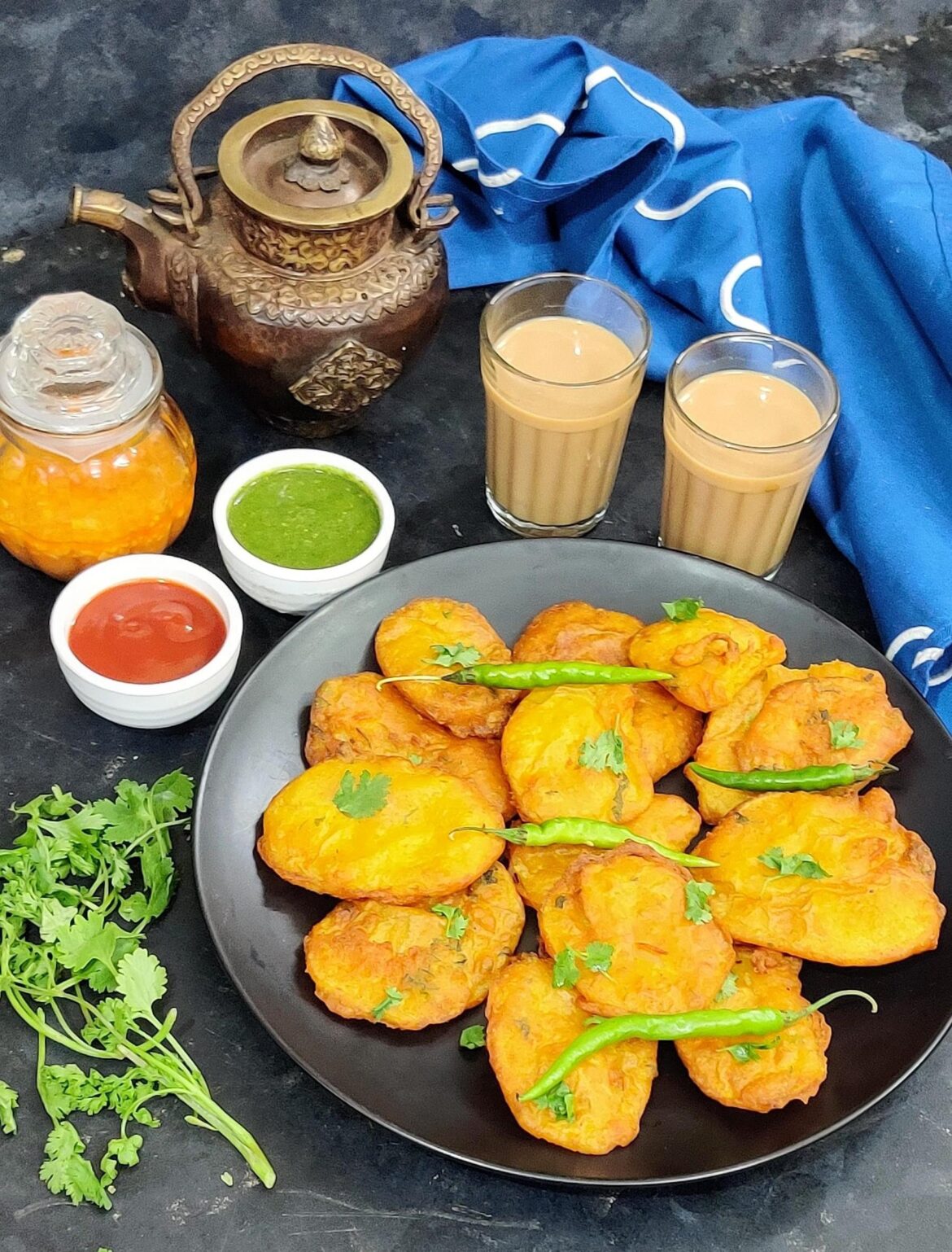 A crispy layer on the outside and melt in your mouth soft potato inside Potato fritters | Aloo Pakora | Alu Bhajiya | Potato Pakoda | Aloo ka Pakora is vegan, gluten free and delicious recipe worth trying.