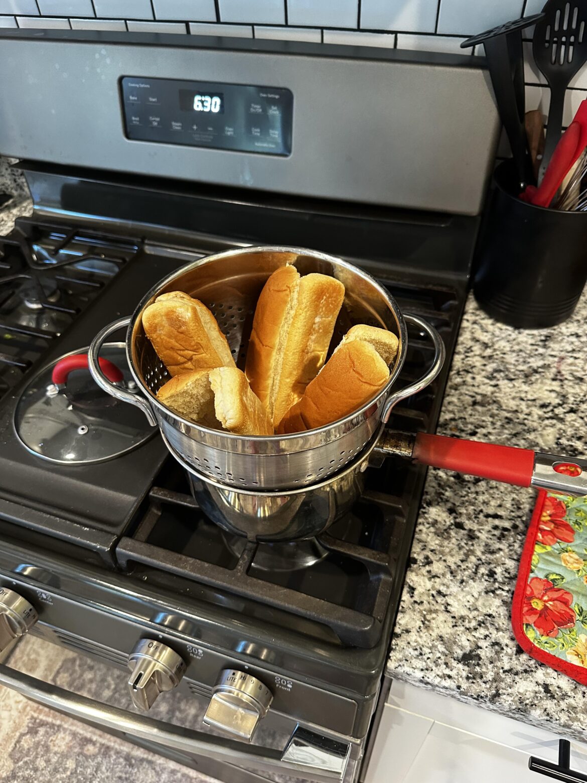 Put a strainer over your pot when boiling hotdogs to steam your buns.