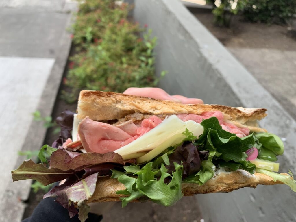 House-roasted beef, asiago, horseradish cream, caramelized onions, pickled onions, white itachi cucumber, and spring mix, on a toasted baguette.
