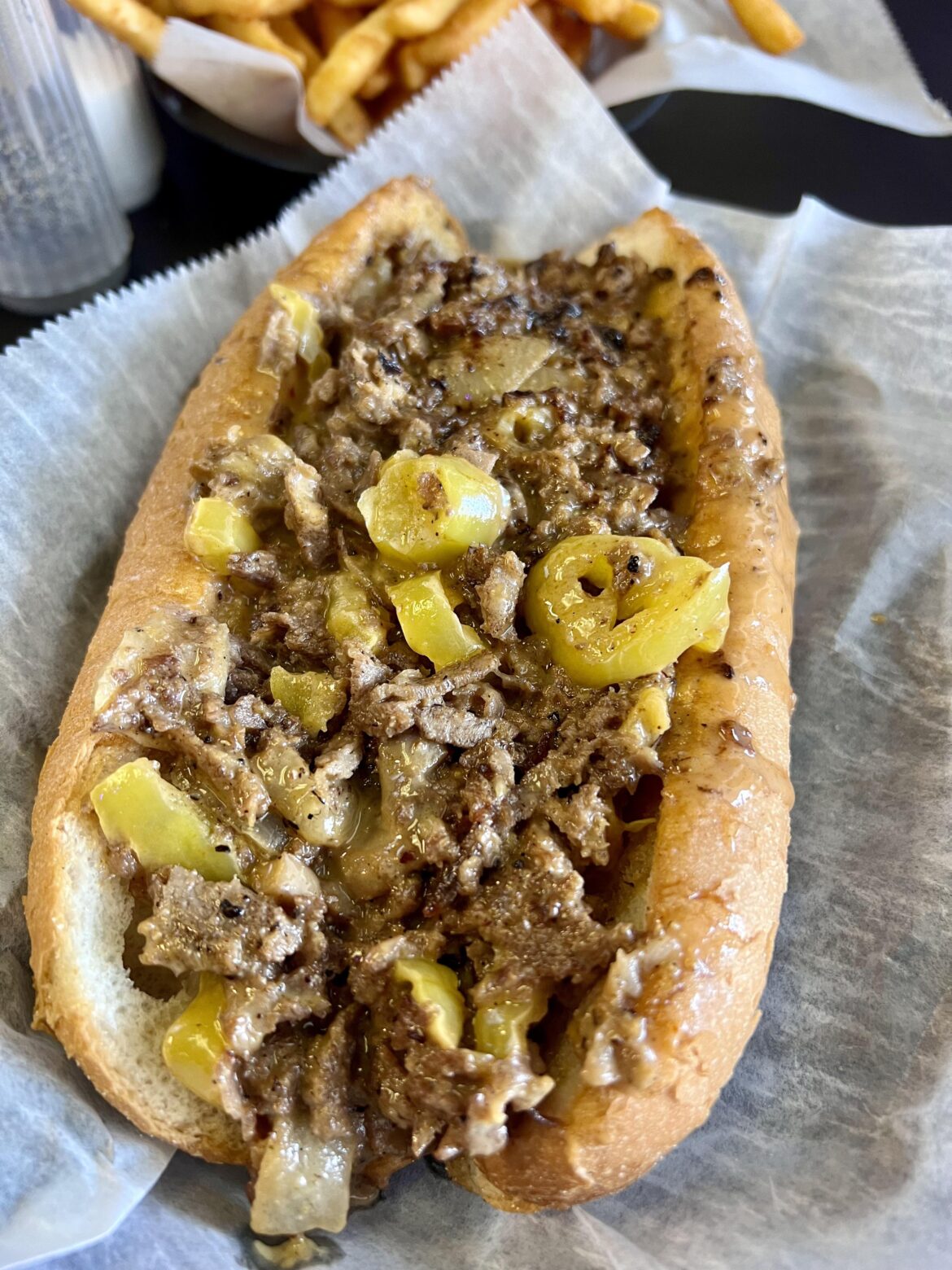 Cheesesteak w/ wiz + onions + banana peppers [I Ate]
