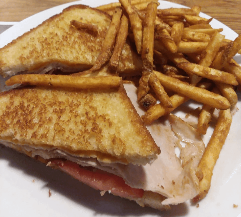 Turkey Club Sandwich with Seasoned Fries