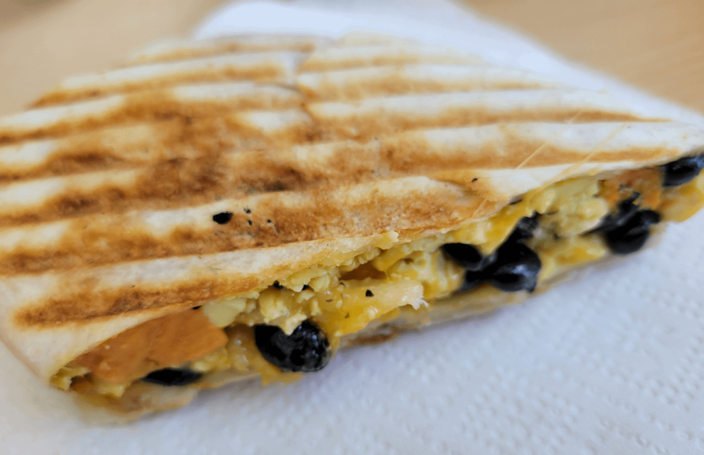 Black Bean, Sweet Potato, and Scrambled Egg Flatbread Sandwich