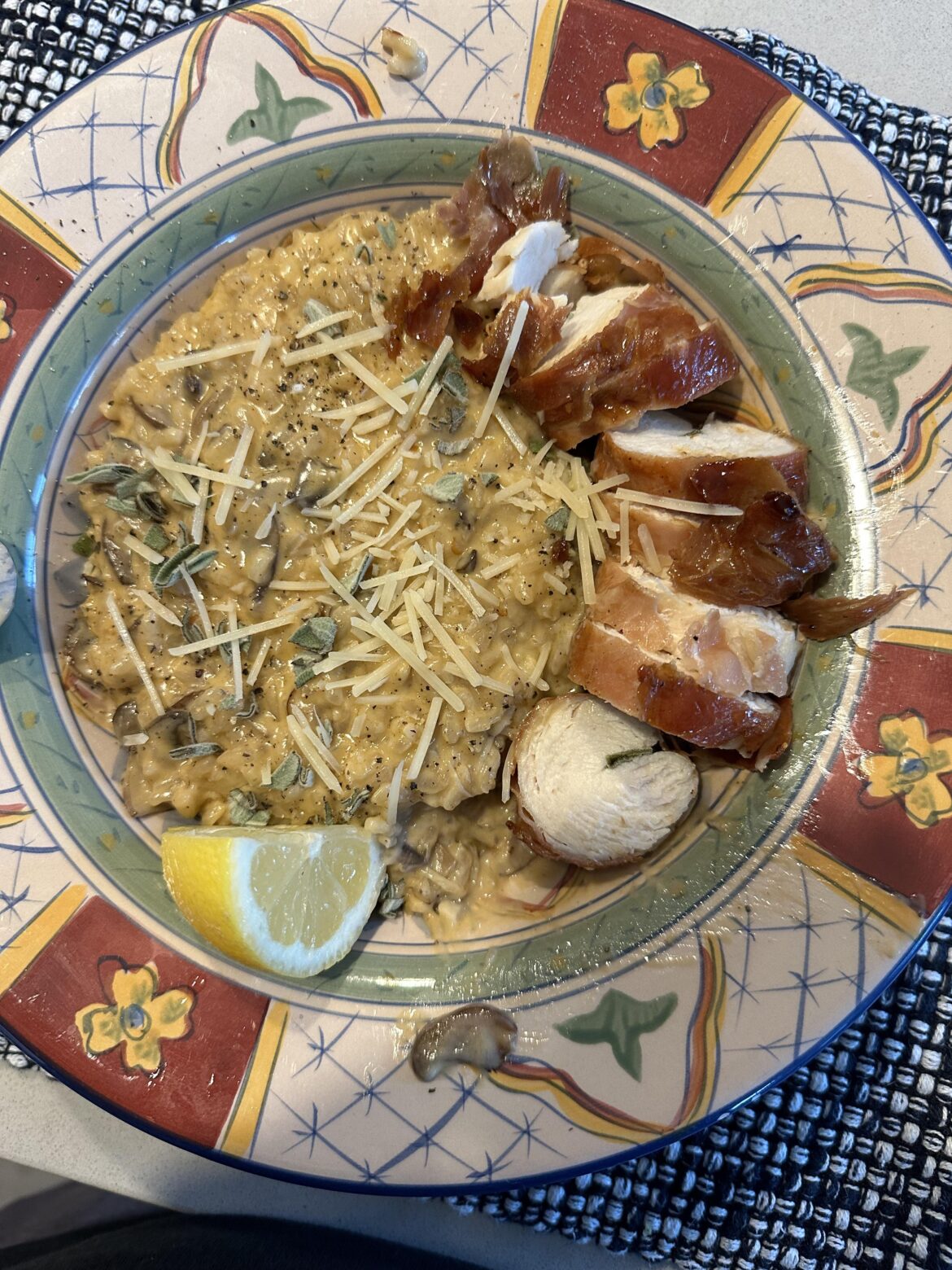 Prosciutto wrapped chicken and truffle risotto with mushrooms and sage