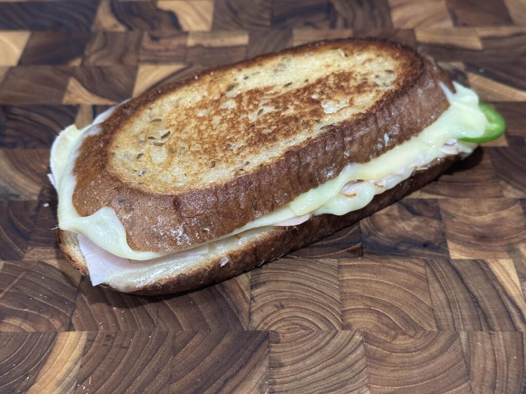 turkey and jack on rye w/shallot, jalapeño and yellow mustard