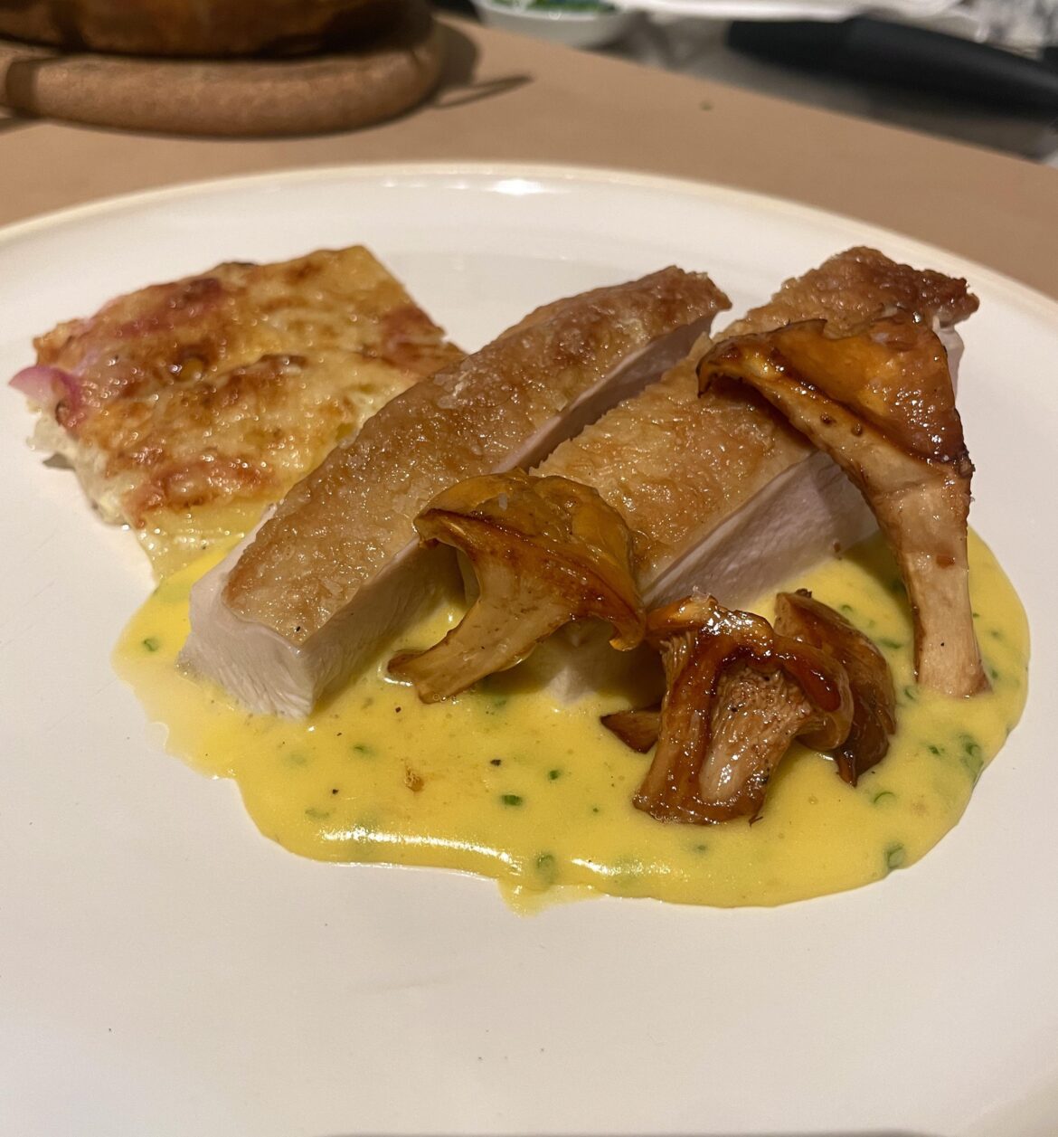 Chicken, summer chanterelles, and a rustic style gratin