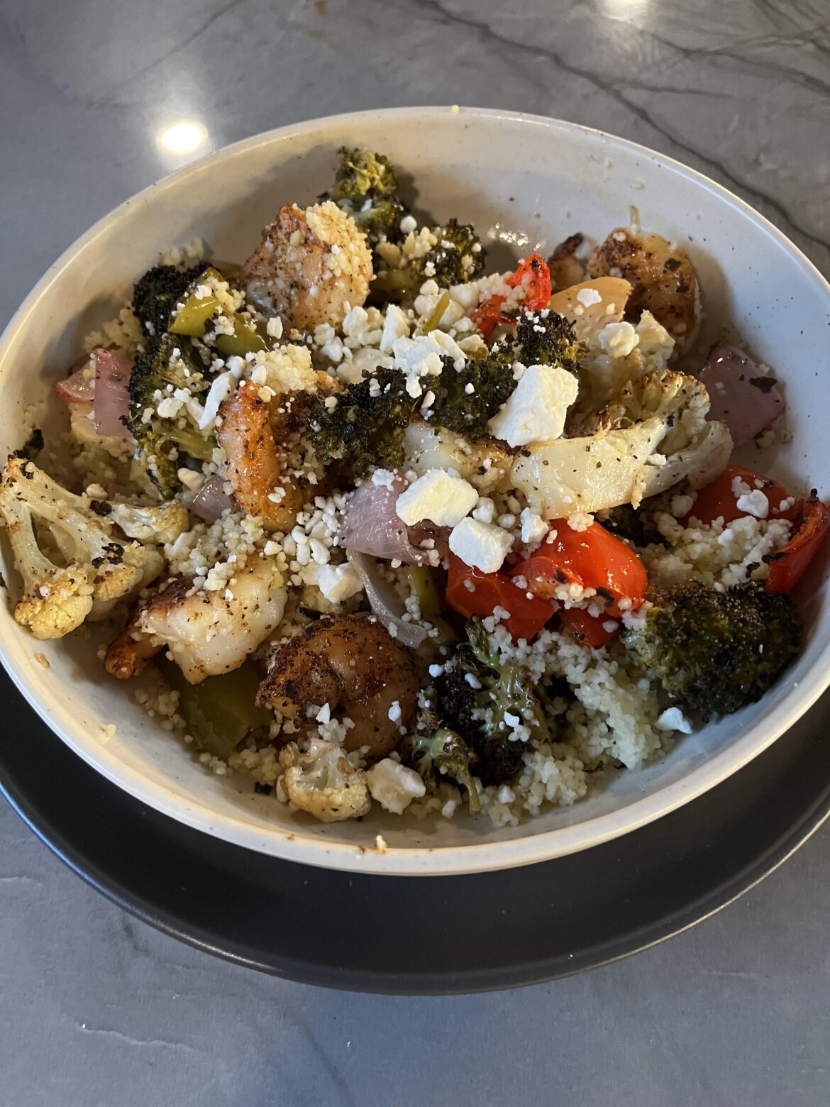 Gulf shrimp, roasted vegetables, couscous and feta.