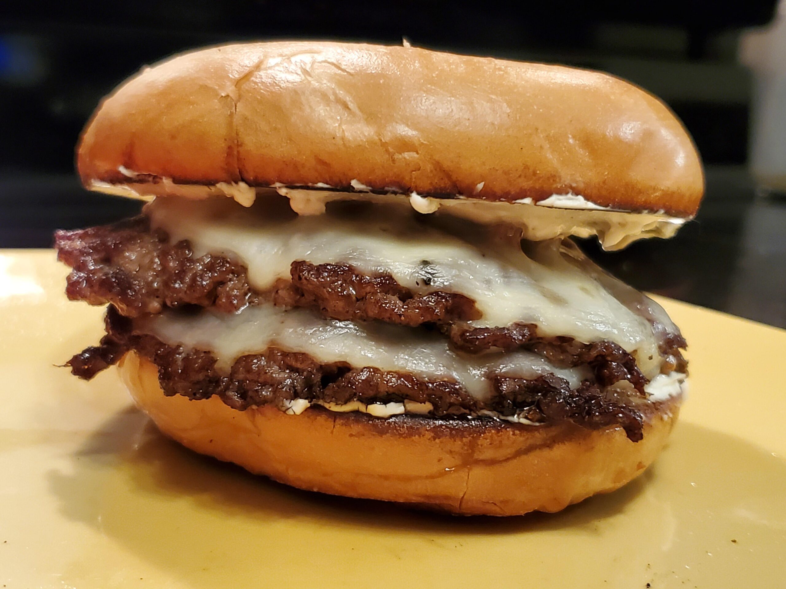 I made a bagel burger with provolone and jalapeño cream cheese Dining