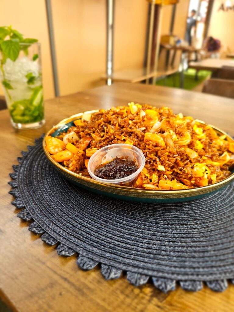 Delicious Jollof Rice and Shito (Black Pepper fried with shrimps) ~ Kumasi, Ghana