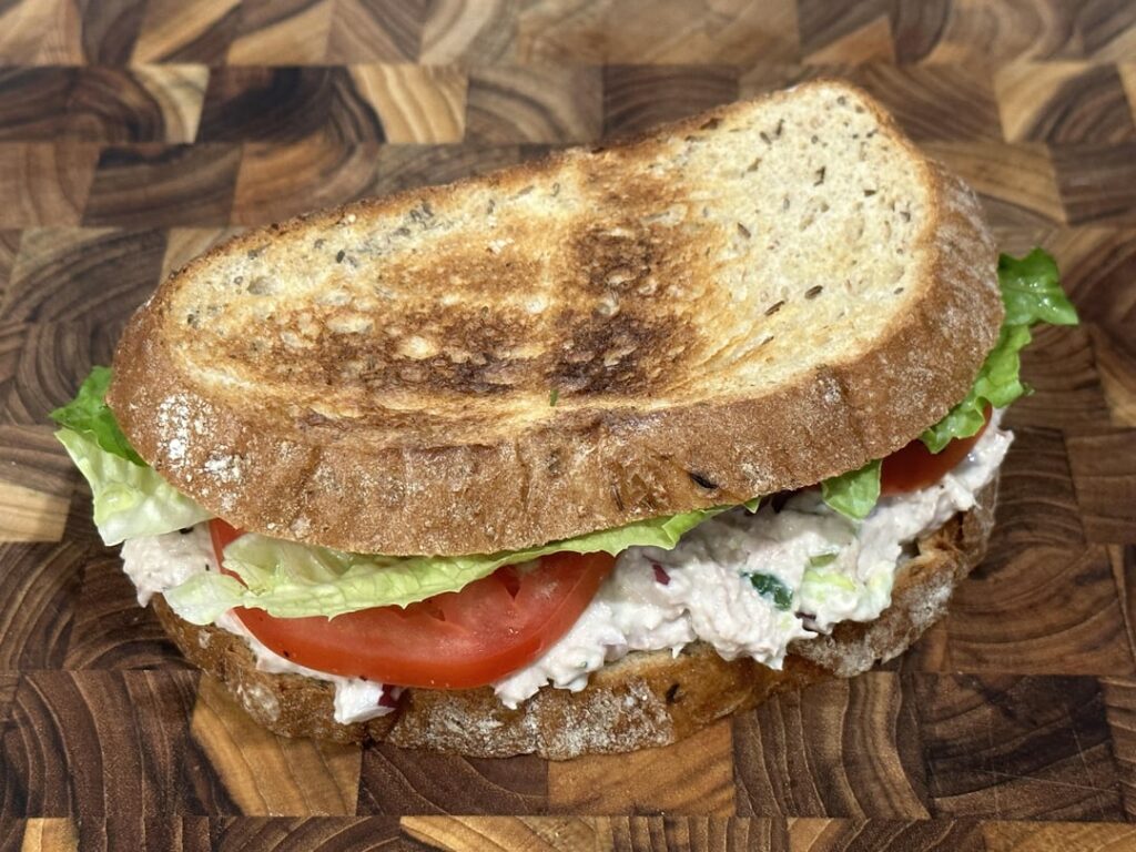 spicy tuna salad, mustard, tomato and romaine