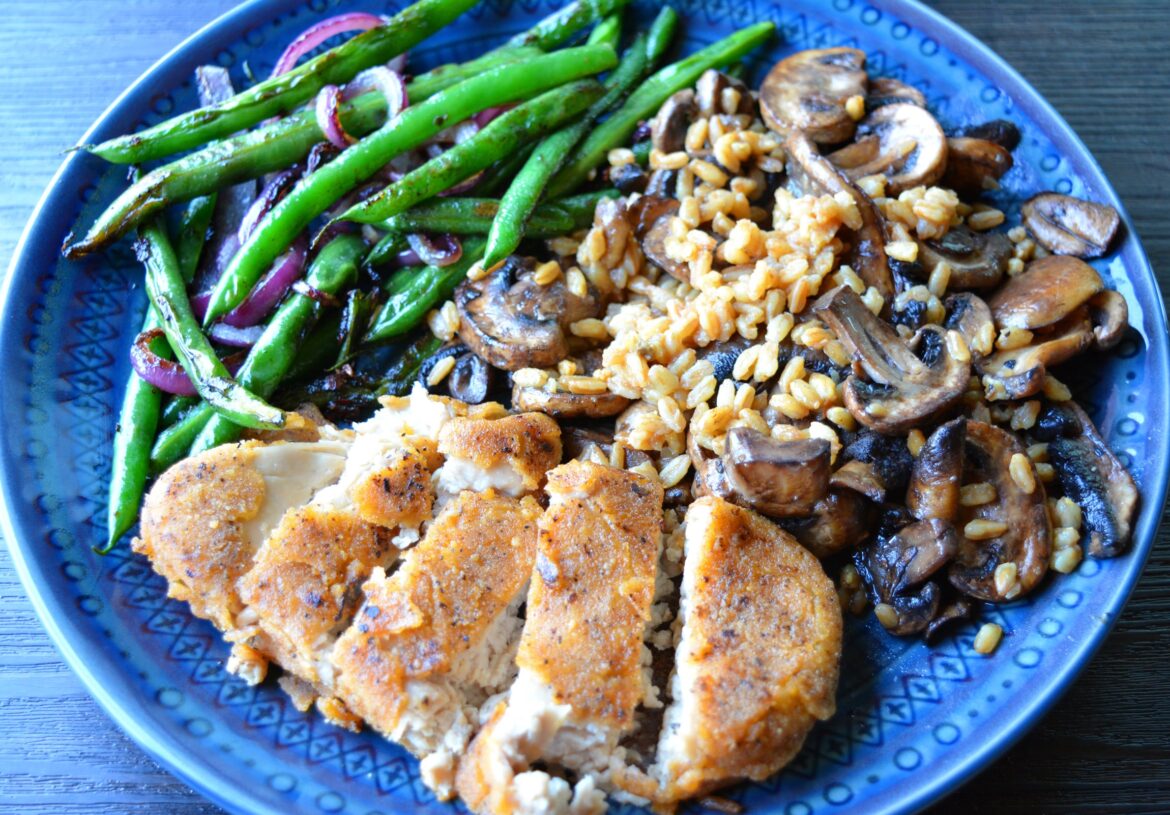 (29 grams protein, 367 Calories) Mushroms & seasoned farro, green beans, with chik'n cutlet.