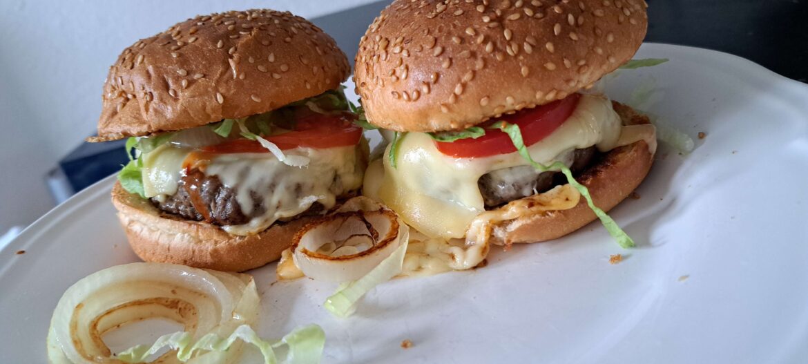 Black Angus Beef Burgers with a few drops of hot sause