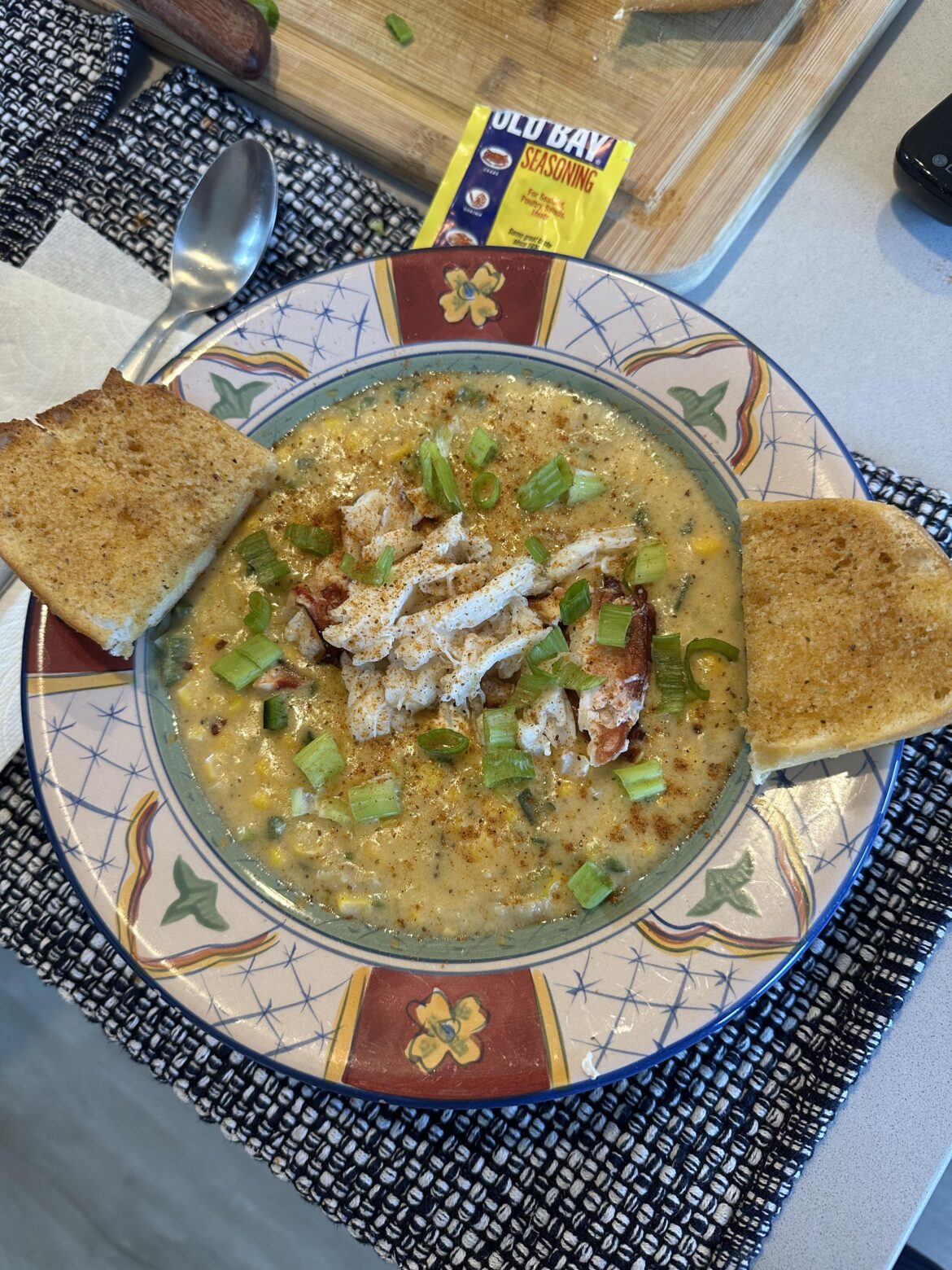 Corn and poblano chowder with leftover Dungeoness crab on top and old bay toast