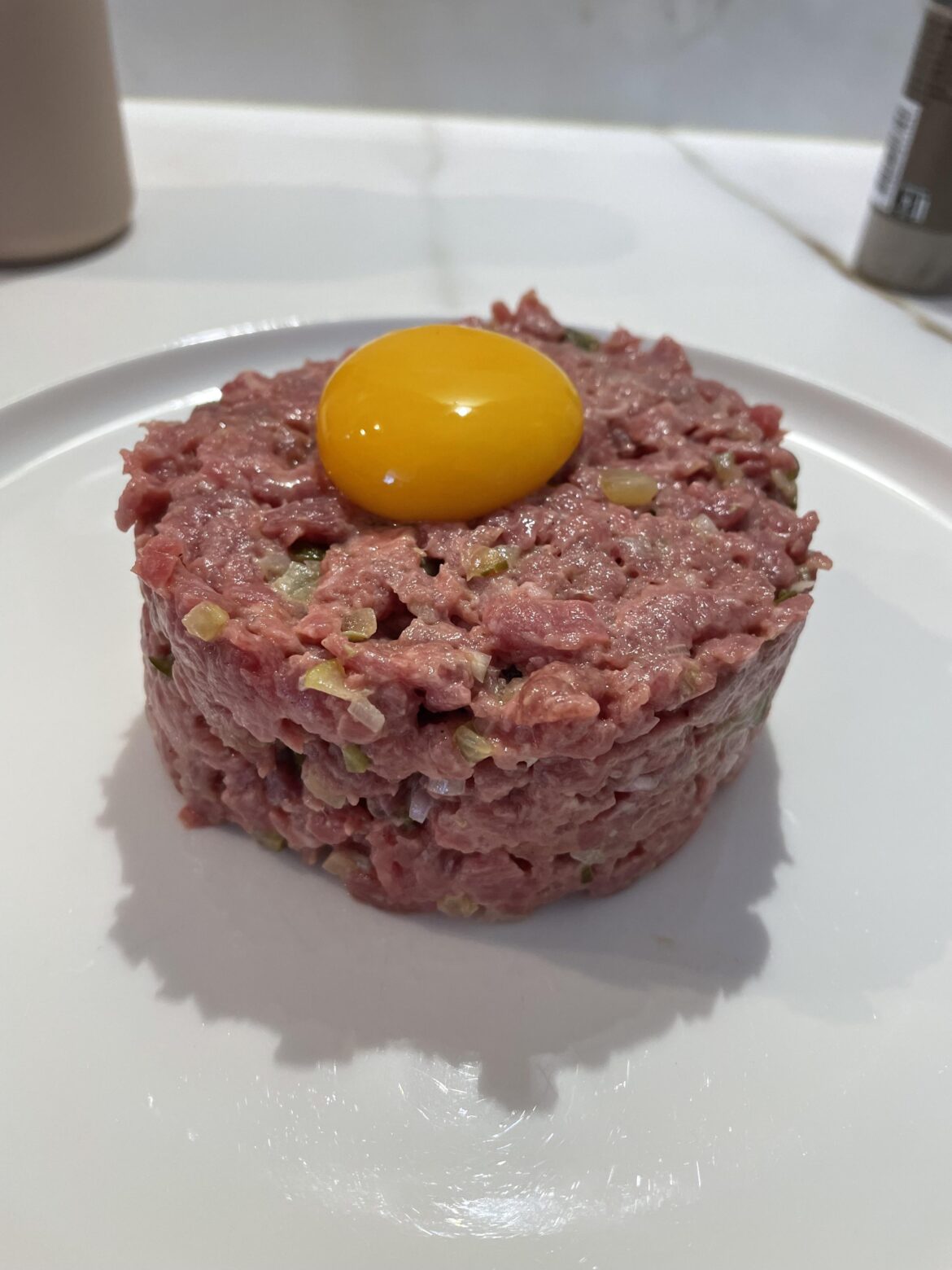 Steak tartare with egg on top