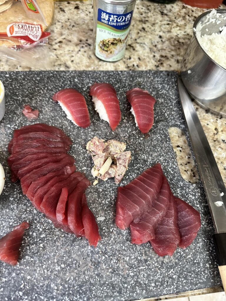 Bought myself a 2.5lb slab of yellowfin and made some nigiri, sashimi, and poke.