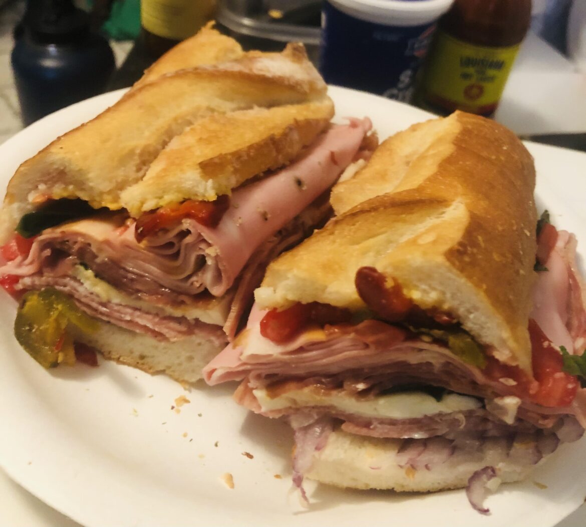 Mortadell, Fennel Salami, Serrano Ham, Fresh Mozz w/Hot Pepps, Basil, Red Onion and Tomatoes